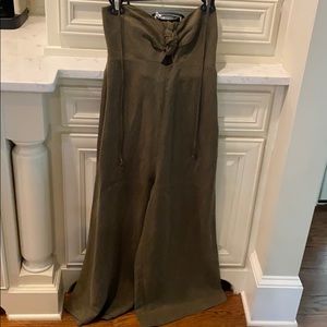 Green jump suit with a halter top